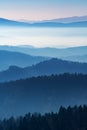 Beautiful view of numerous layers of forests, hills, mountains and hazy valleys