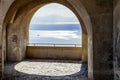 Beautiful view of the ocean through the arches of a balcony Royalty Free Stock Photo