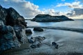 Beautiful view of an ocean waves hitting rocky coast in Wickaninnish Beach, Tofino, Canada