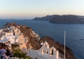 Beautiful view from Oia to Santorini caldera and volcano during golden hour Royalty Free Stock Photo