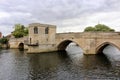 Ancient Medieval bridge over the river Ouse at St Ives with the Bridge chapel clearly visible. Royalty Free Stock Photo