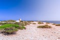 Beautiful view of the old observation tower Torre De Ses Portes and coast of the Ibiza island Royalty Free Stock Photo