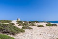 Beautiful view of the old observation tower Torre De Ses Portes and lighthouses on the coast of the Ibiza island Royalty Free Stock Photo