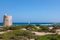 Beautiful view of the old observation tower Torre De Ses Portes and sailing yacht off the coast of Ibiza island Royalty Free Stock Photo