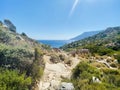 Rocky path down to the sea in Ikaria, Greece