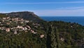 Beautiful view over the wood-covered hills of the mediterranean coast near small village Eze at the French Riviera. Royalty Free Stock Photo