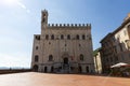 Beautiful view of Palazzo dei Consoli, a medieval building facing the scenic Piazza Grande in Gubbio, Umbria, central Italy