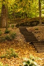 Beautiful view of park with trees and stairs on autumn day Royalty Free Stock Photo