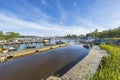 Beautiful view of parking place for motor boats on beautiful lake in  forest. Gorgeous green nature landscape view. Royalty Free Stock Photo