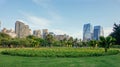 Beautiful view of Parque do Povo, city park in Sao Paulo, Brazil with buildings and a cloudy sky