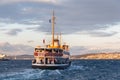 Beautiful view of passenger ferry | Vapur sailing in the bosphorus during sunset Royalty Free Stock Photo