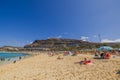 Beautiful view of people on Amadores Beach of Grand Canaria on hot summer sunny day. Gran Canary.