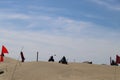 Beautiful view of people driving a  four-wheeler bike on the sand on Baja, California beach, Mexico Royalty Free Stock Photo