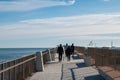 Beautiful view of people walking along the harbor promenade Royalty Free Stock Photo