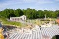 Beautiful view of Peterhof Palace yard, garden, and fountains in Saint Petersburg