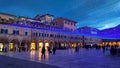 Beautiful view of Piazza Del Popolo in the historic center of Ascoli Piceno at christmas time with blue lights