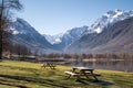 Beautiful view of a picnic area with snow-capped mountains in the background. Royalty Free Stock Photo