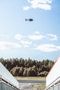 Beautiful view from a plane ladder, forest trees under a helicopter flying in the blue sunny sky Royalty Free Stock Photo