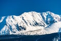 A beautiful view of the Polish Tatra Mountains. Sunny, beautiful day in the winter, snow-capped mountains and blue sky. Royalty Free Stock Photo