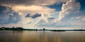 beautiful view of the pond against the backdrop of white clouds Royalty Free Stock Photo