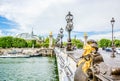 Beautiful view of Pont Alexandre III, bridge with golden sculptures and street lamps, Paris, France