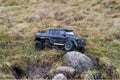 Beautiful view of radio controlled model racing car Mercedes Benz on off-road background. Royalty Free Stock Photo