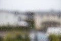 Beautiful view of raindrops on window pane with view from an apartment. Royalty Free Stock Photo