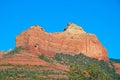 Beautiful view of rock mountain range with juniper trees at the foot in the Northern Arizona deserts Royalty Free Stock Photo