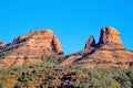 Beautiful view of red rock mountains with juniper trees at the foot in the Northern Arizona deserts Royalty Free Stock Photo