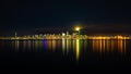 Beautiful view of the reflection lights on buildings in Seattle, USA in the sea at night Royalty Free Stock Photo