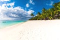 Beautiful view of the resort on Mauritius. Transparent ocean, white sand, palms and sky Royalty Free Stock Photo