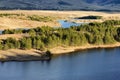 Beautiful view of Ribnicko lake framed by green trees on the shore. Serbia Royalty Free Stock Photo