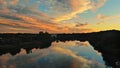 A beautiful view by the river in forest during sunset in sammer evening. majestic sunset in nature fantastic river Royalty Free Stock Photo