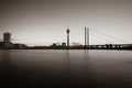 Beautiful view of the river Rhein and a bridge under a clear sky at sunset in Dsseldorf, Germany