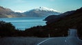 Beautiful view of the road to Glenorchy with Wakatipu Lake and snowy mountain in the background taken on a winter day in Royalty Free Stock Photo