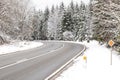 Beautiful view of the road in the winter forest. Royalty Free Stock Photo