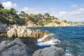Beautiful view on rocky beach in Lloret de Mar, Costa Brava, Spain. Rocks and stones in sea on spanish coastline in Lloret