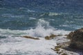 Beautiful view of rocky coast of Caribbean Sea with waves crashing rocks on island of Aruba Royalty Free Stock Photo