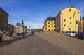 Beautiful view of Royal Palace square with monument to Charles XIV Johan against blue sky. Sweden.