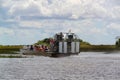 Beautiful view of safari during airboat tour. Group of people in the airboat. Safari park. Airboat rides. Miami.