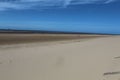 Beautiful view of the sandy beach on a clear and sunny summer day Royalty Free Stock Photo