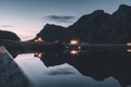 Beautiful view of scenic Lofoten Islands archipelago winter scenery with traditional yellow fisherman Rorbuer cabins in the Royalty Free Stock Photo