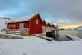 Beautiful view of scenic Lofoten Islands winter scenery with fisherman Rorbuer at sunset