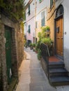 Beautiful view of scenic narrow alley with historic traditional houses and cobbled street Royalty Free Stock Photo