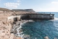 Beautiful sea caves with cape Greco on background in national park Royalty Free Stock Photo