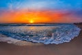 Beautiful view of the sea in the morning sunrise with lace like waves washing the shore