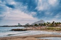 Beautiful view of the sea and a populated beach in Villeneuve-Loubet, France, on a cloudy day