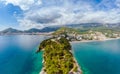 Beautiful view from sea to Budva coast and resort town of Becici on background of mountains, Montenegro Royalty Free Stock Photo