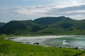 Beautiful view of a seascape on a mountain background in Refviksanden Beach