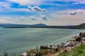 Beautiful view of Sevan lake with turquoise water and green hills, Sevan, Armenia. May 6, 2019. Royalty Free Stock Photo